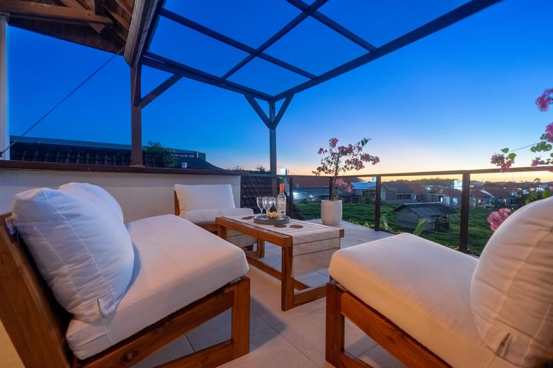 Rooftop terrace daybeds at sunset