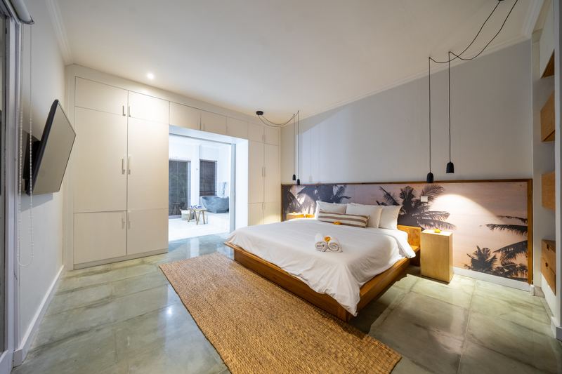 Super king bedroom opening directly onto the pool terrace